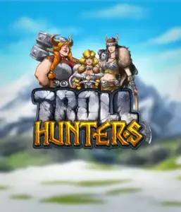 Изображение слота "Troll Hunters" от Play'N Go, где изображены три викинга: две женщины и один мужчина, облаченные в традиционные викингские доспехи. На фоне виднеются горные вершины, что создаёт атмосферу скандинавской мифологии. Этот слот идеален для любителей викингских саг и поисков приключений.